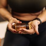 fit-woman-taking-supplements-hard-1007276146.jpg