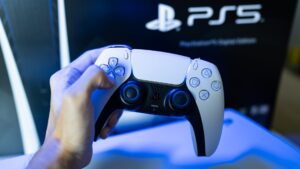 gamer-playing-playstation-5-game-834465574.jpg