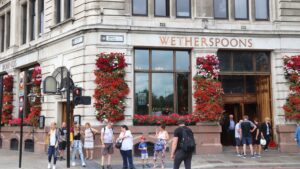 people-visit-wetherspoons-pub-london-799488034.jpg